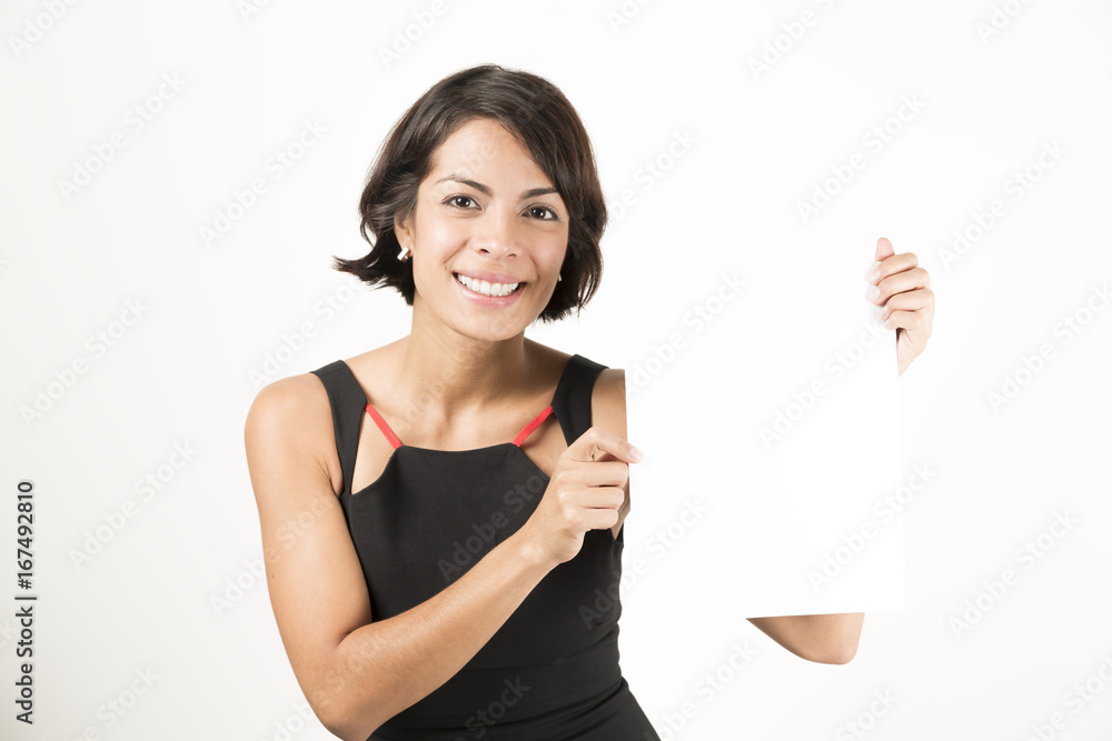 Beautiful young woman holding a blank sheet of paper