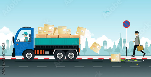 A truck driver makes a parcel fall from a broken car on the street.