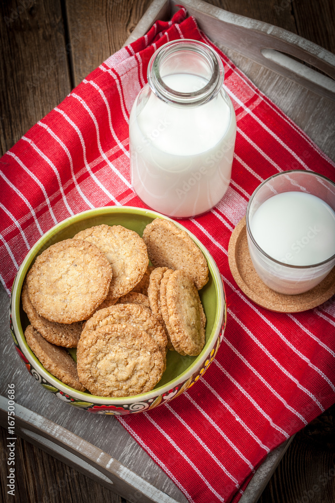 Stack of freshly baked oat biscuits in a bowl. Stack of freshly baked oat biscuits in a bowl.