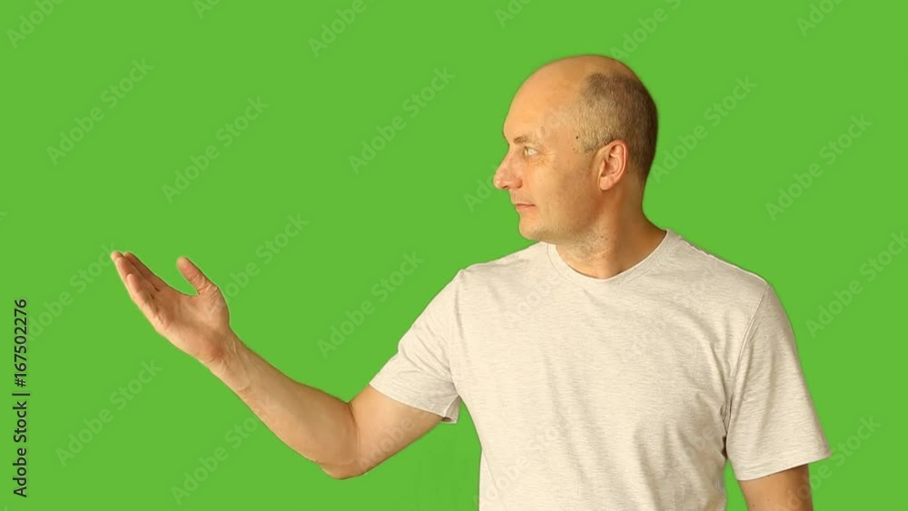 Man choice date on calendar. Planning period of month. Plan vacation season period on virtual screen. Alpha channel green screen background. Adult caucasian bald man hand finger touch virtual screen. Man choice date on calendar. Planning period of month. Plan vacation season period on virtual screen. Alpha channel green screen background. Adult caucasian bald man hand finger touch virtual screen.