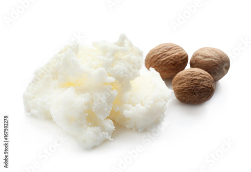 Photos Shea butter and nuts on white background