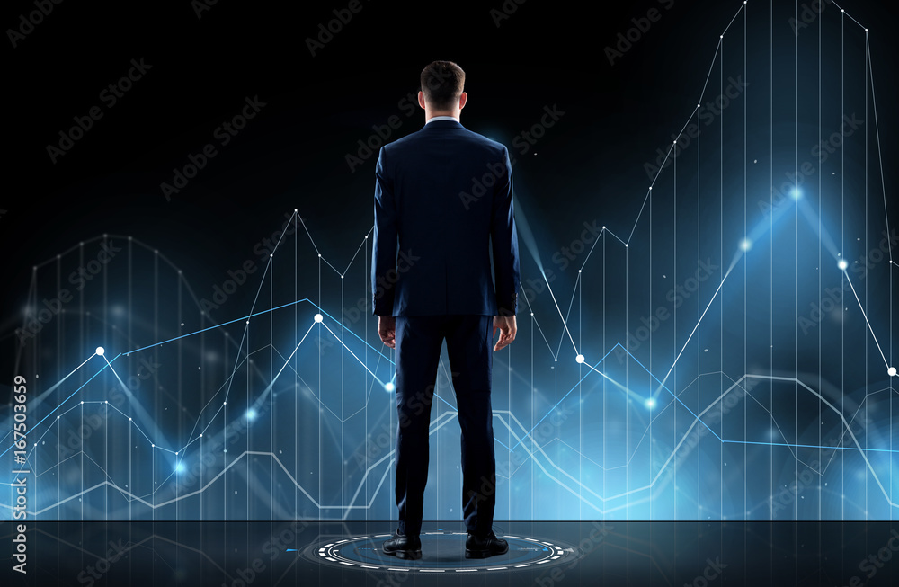 businessman in suit from back with virtual graph businessman in suit from back with virtual graph