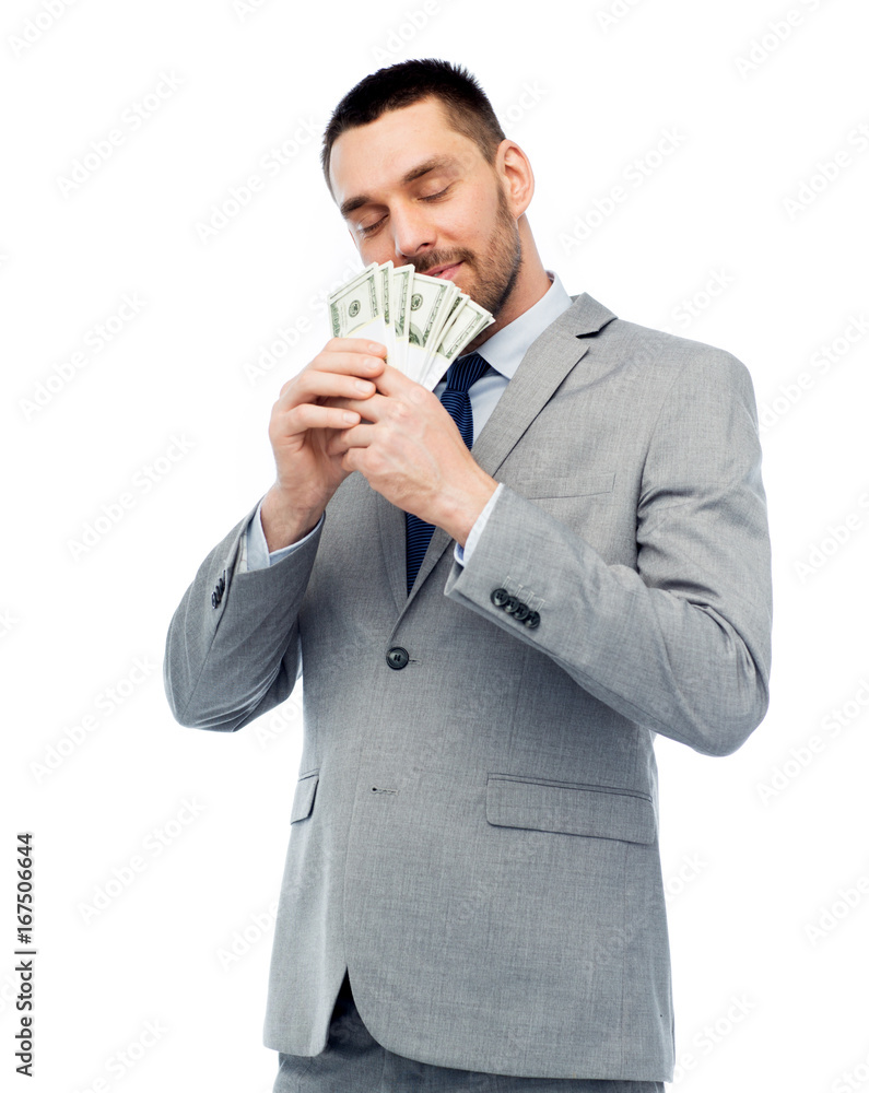 businessman smelling american dollar money businessman smelling american dollar money