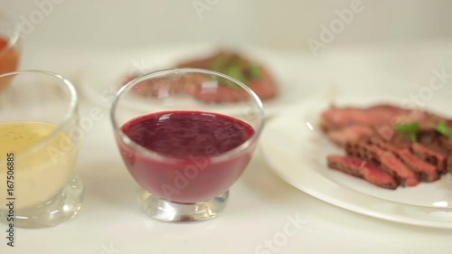 Wallpaper Mural Presentation of a delicious beef served with a variety of sauces for meat Torontodigital.ca