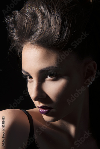 Girl with clean skin on a black background