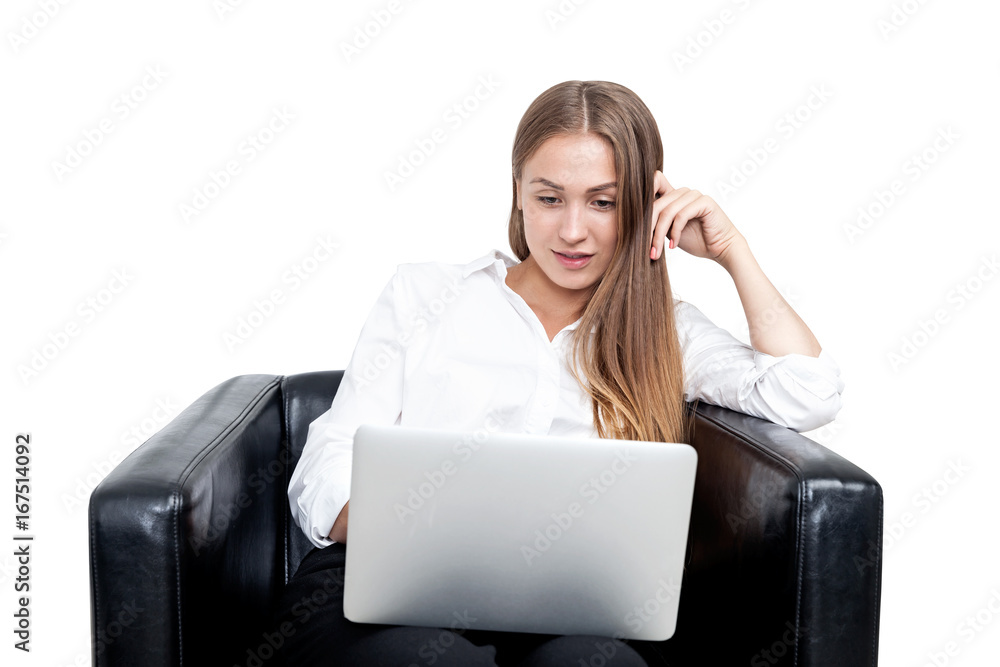 Blonde woman in armchair, laptop, isolated Blonde woman in armchair, laptop, isolated