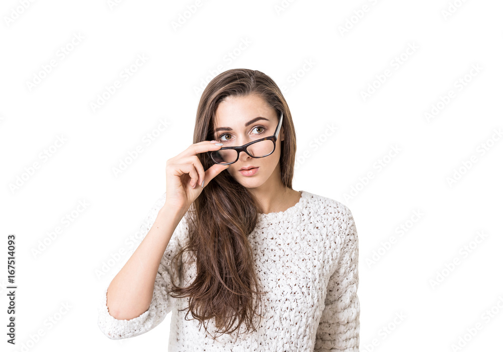Young woman in sweater taking off glasses isolated Young woman in sweater taking off glasses isolated