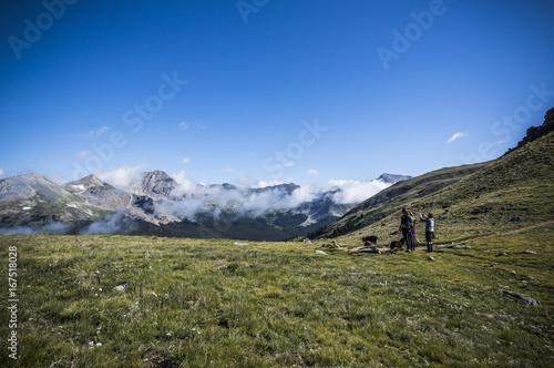 Hikers on Field on Brown's Pass in Mountains