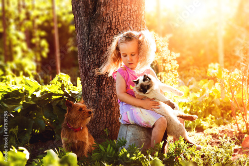 Little girl with pets