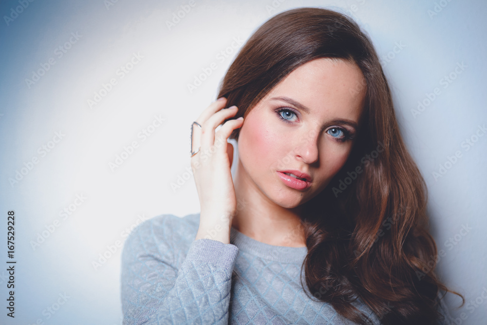 Portrait of an attractive fashionable young brunette woman Portrait of an attractive fashionable young brunette woman