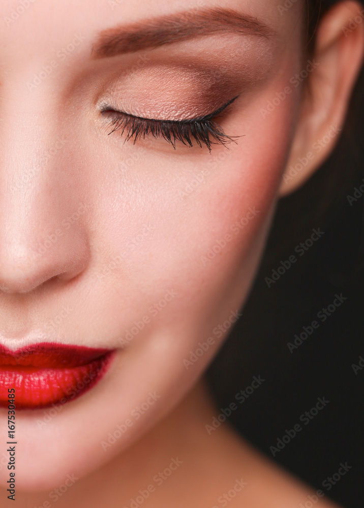 Fototapeta premium Close up portrait of beautiful young woman face