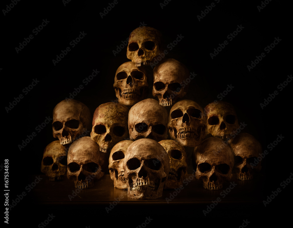 Genocides, Stacked human skulls at the Killing Fields, Sepia Tone Genocides, Stacked human skulls at the Killing Fields, Sepia Tone