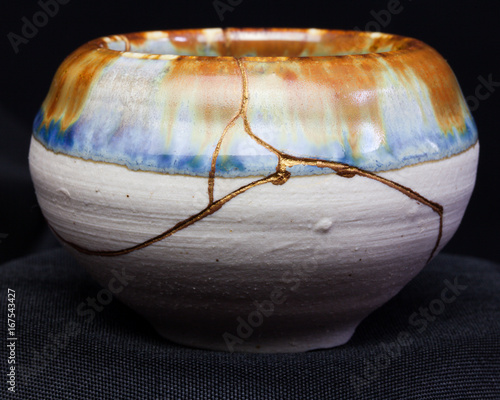 A handmade pot made that was broken and I repaired with the Japanese art form of kintsugi.
