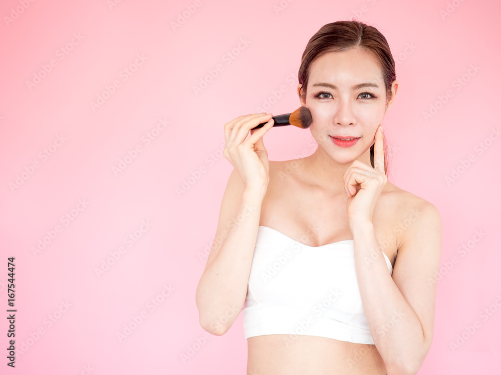 Beautiful asian woman on pink background, make up, healthy skin, beauty, cute asian woman concept Beautiful asian woman on pink background, make up, healthy skin, beauty, cute asian woman concept