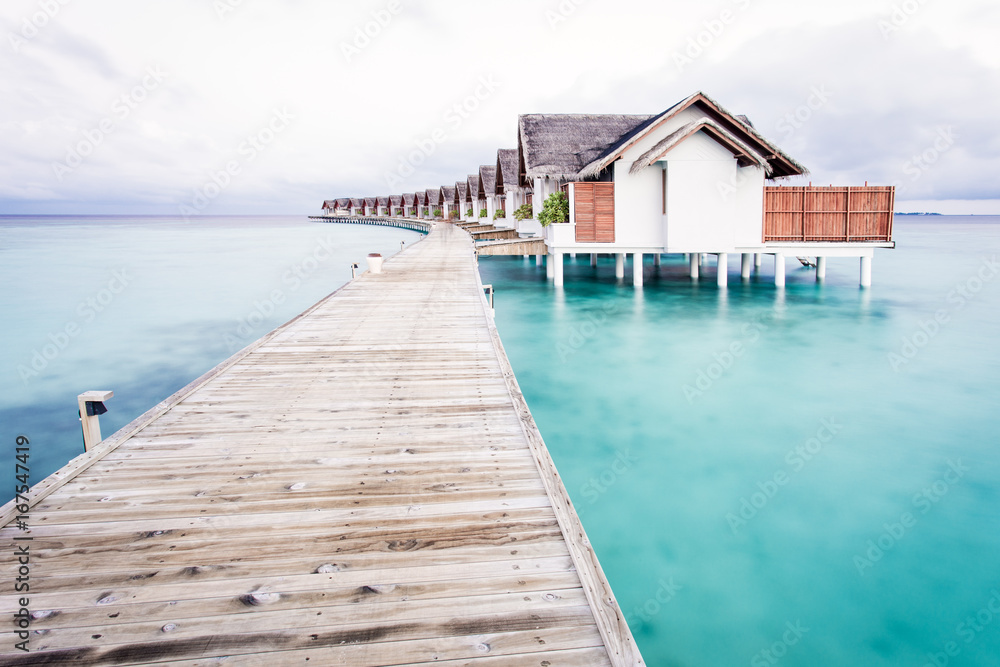 Overwater Bungalows Along Boardwalk Overwater Bungalows Along Boardwalk