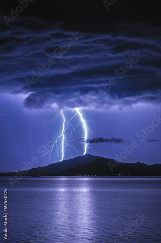 Two lightning. Heavy thunderstorm at Bukhtarma Reservoir, Eastern Kazakhstan