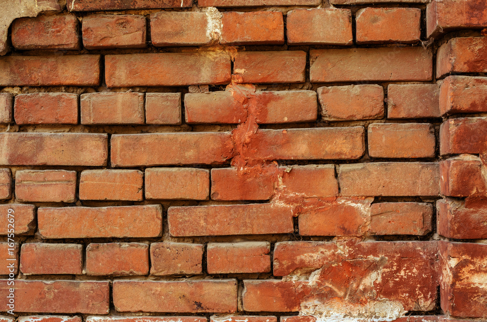 Fototapeta premium An old brick wall with