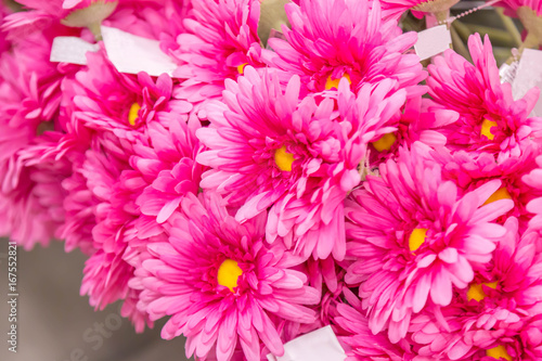 pink Gerbera plastic flowers in vase  furniture mall.