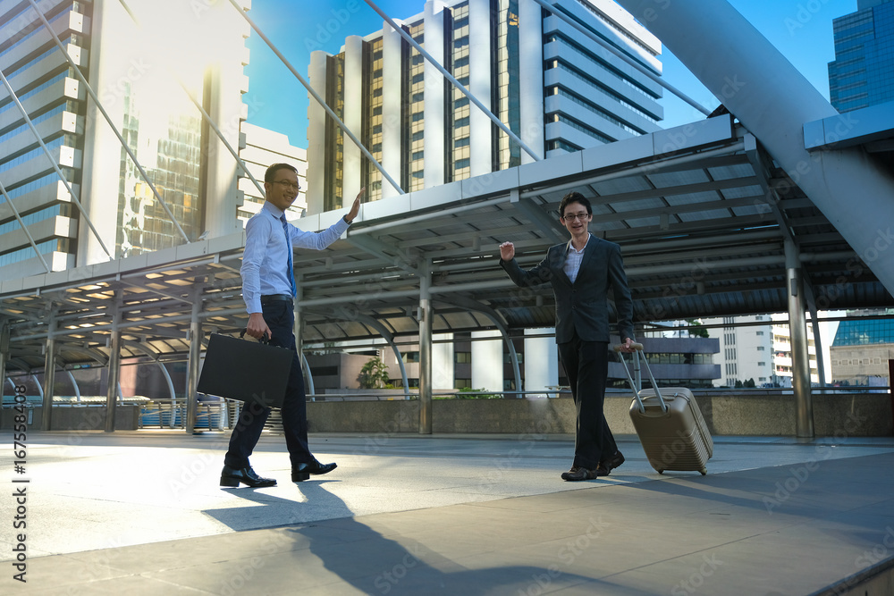 Two business man walking out side in office modern area in middle of the city . Two business man walking out side in office modern area in middle of the city .