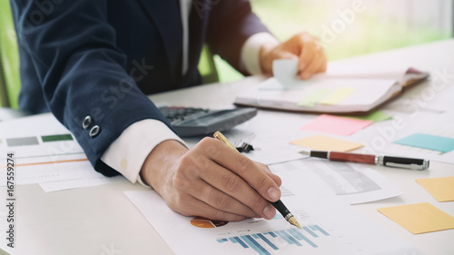 Fotografie Close up accountant or banker making calculations