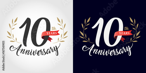 10 years anniversary number hand lettering and golden laurel wreath. Handmade calligraphy, Vintage style