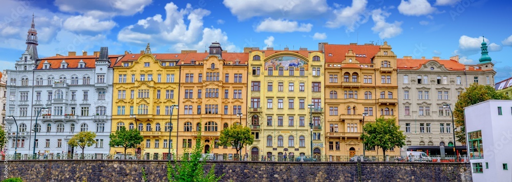 Architecture of Prague, The Czech Republic. Blue sky by the river.