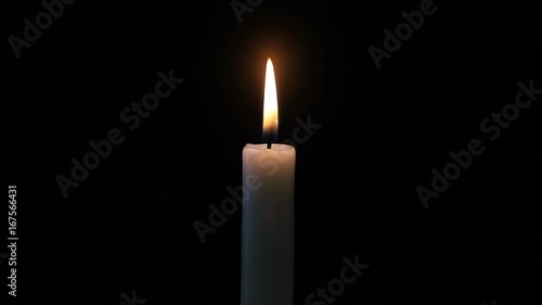 Candle On Black Background