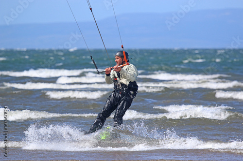 kitesurfer in waves
