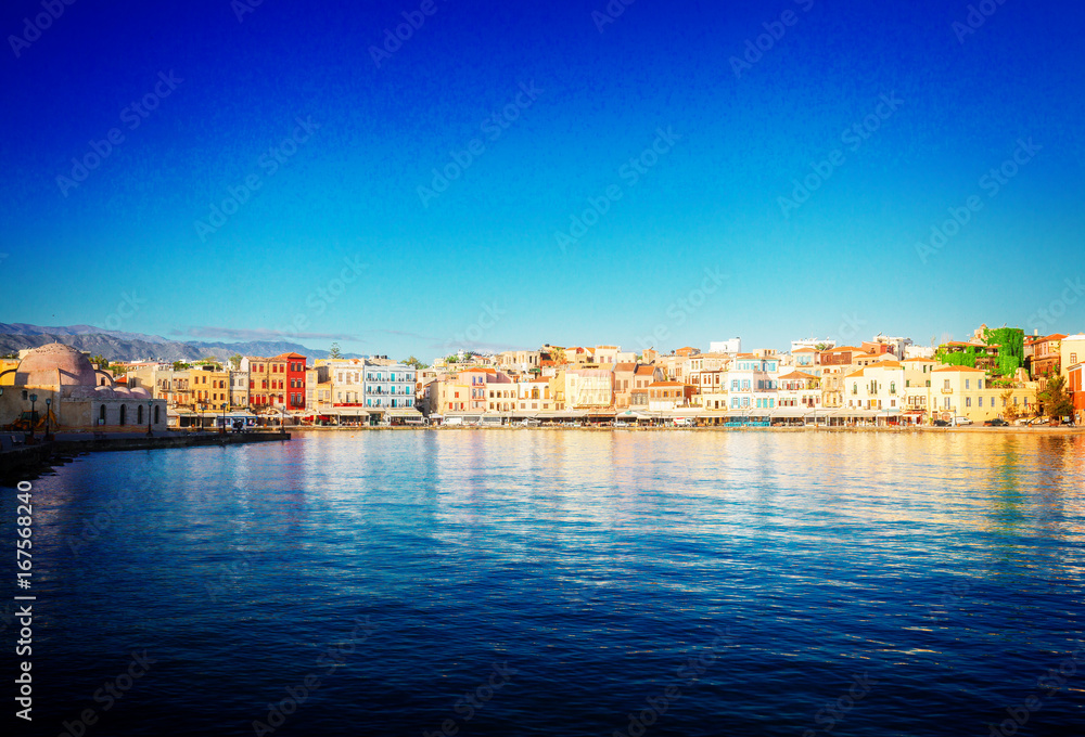waterfront of Chania bay at sunny day, Crete island, Greece, retro toned