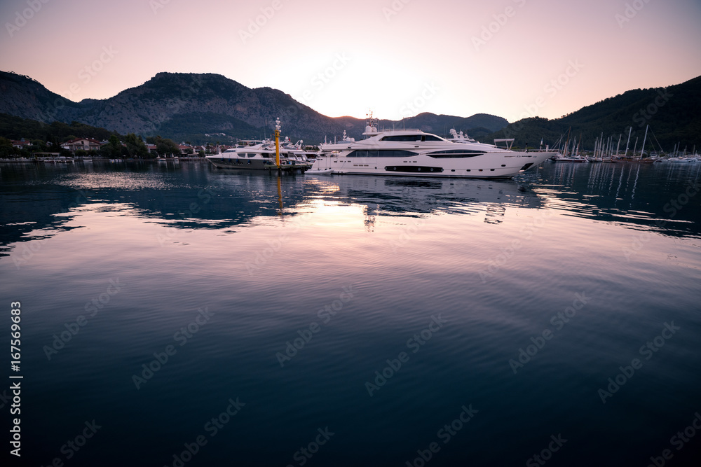 Yachts in bay with morning light