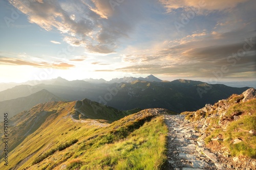 Trail among the peaks in the Carpathian Mountains at dawn