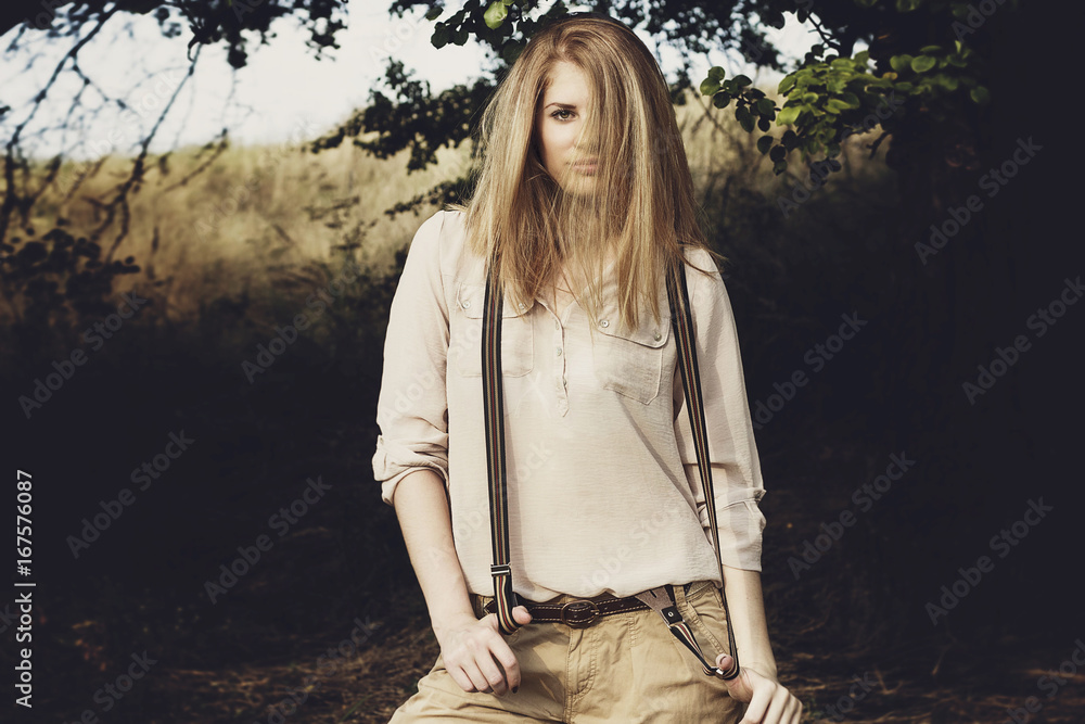 Young attractive redhair woman outside in fields. Freedom concept. Young attractive redhair woman outside in fields. Freedom concept.