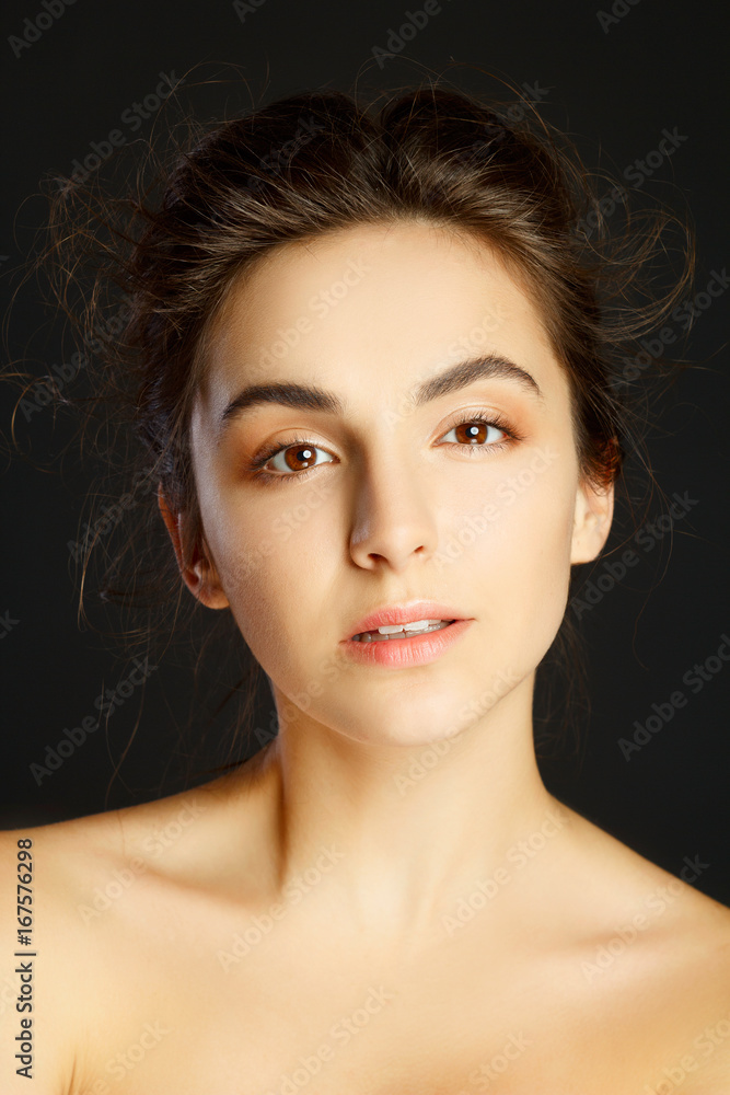Beauty portrait of young pretty woman in studio. Face care concept. Beauty portrait of young pretty woman in studio. Face care concept.