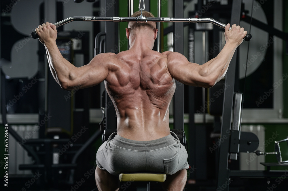 Naklejka premium young man train in gym healthcare lifestyle sexy caucasian man