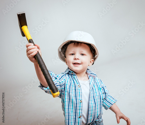 Little boy on the white background. Construction