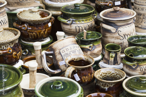 Artistic ceramic bowls as a souvenir at local traditional market in Poland.