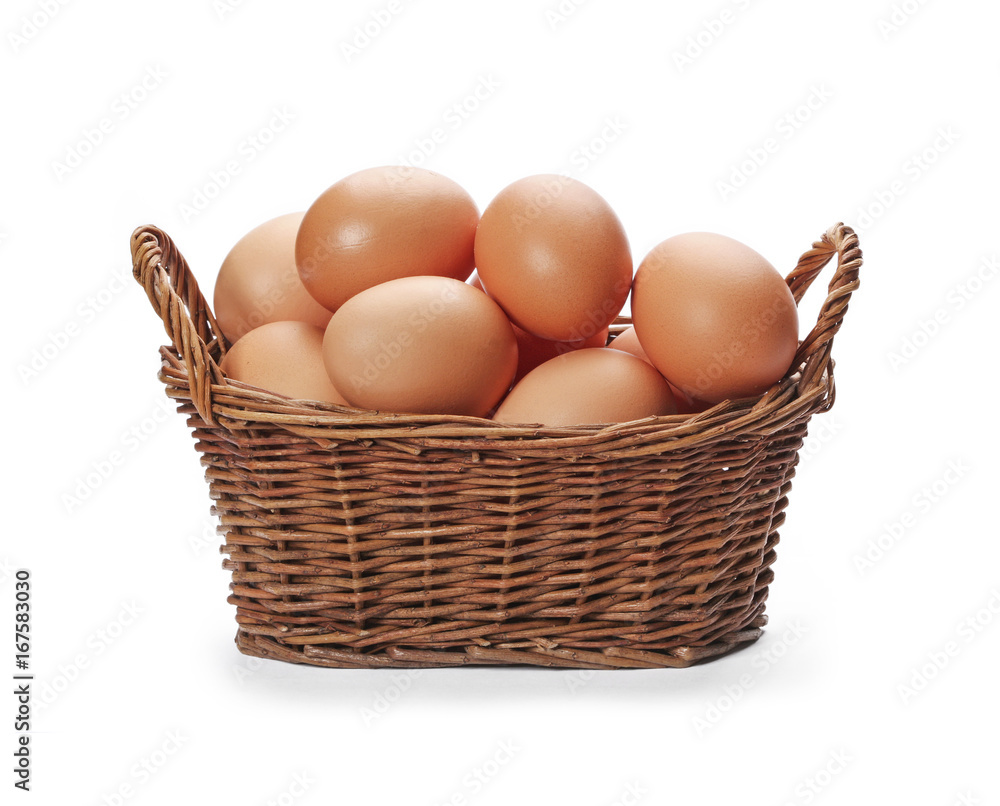 Brown eggs in the basket isolated on white background Brown eggs in the basket isolated on white background