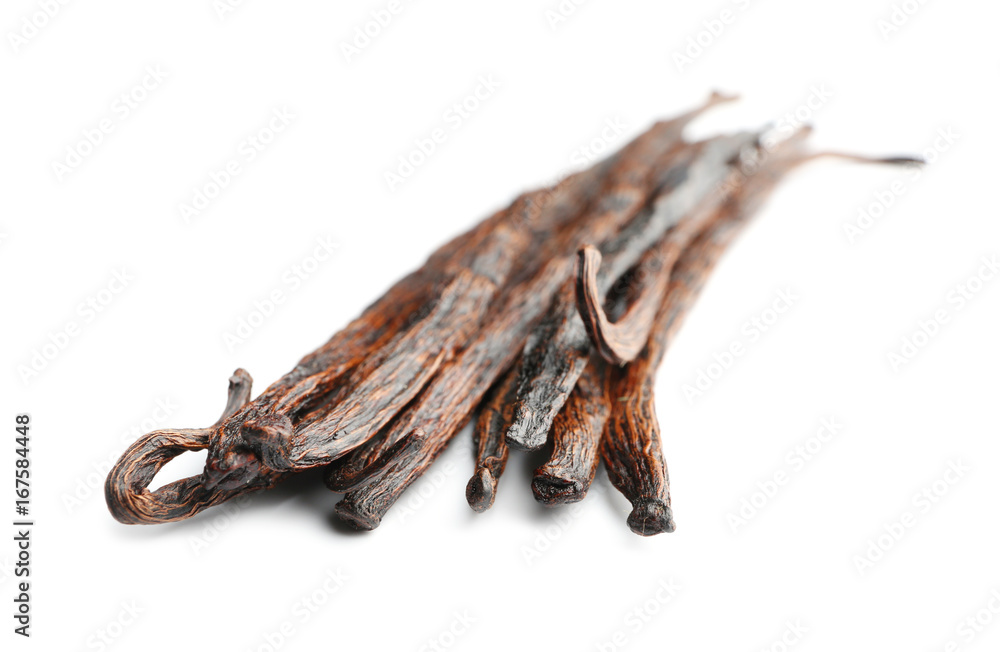 Naklejka premium Vanilla pods on white background