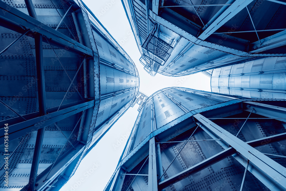 Fototapeta premium Modern silos for storing grain harvest. Agriculture.