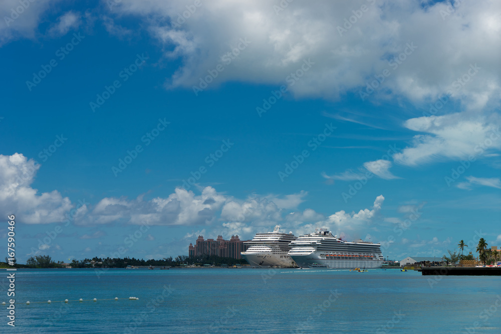 BAHAMAS. Two Cruise ships and beautiful hotel in crystal blue water with