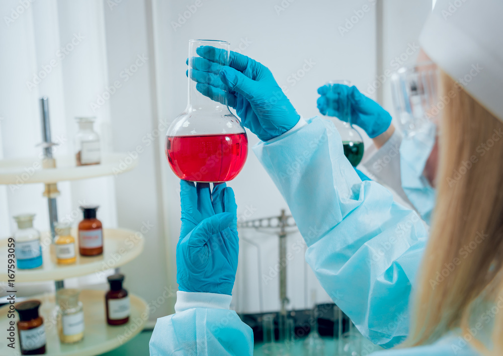 Science technician at work in the laboratory. Science technician at work in the laboratory.