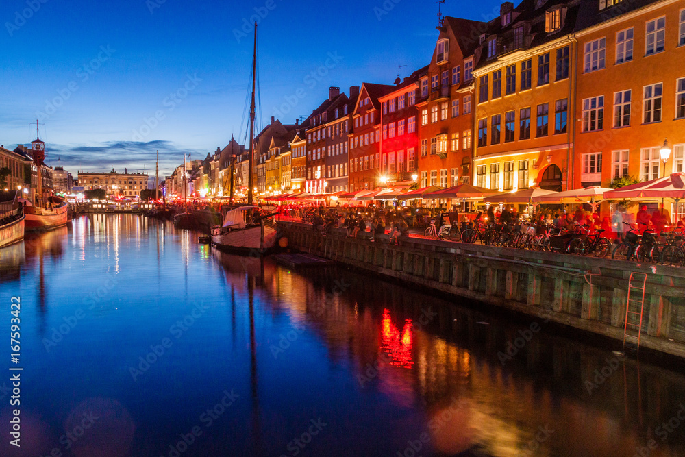 Evening view of Nyhavn district in Copenhagen, Denmark