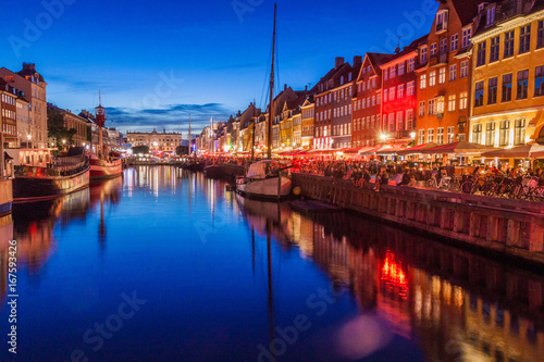Photography Evening view of Nyhavn district in Copenhagen, Denmark