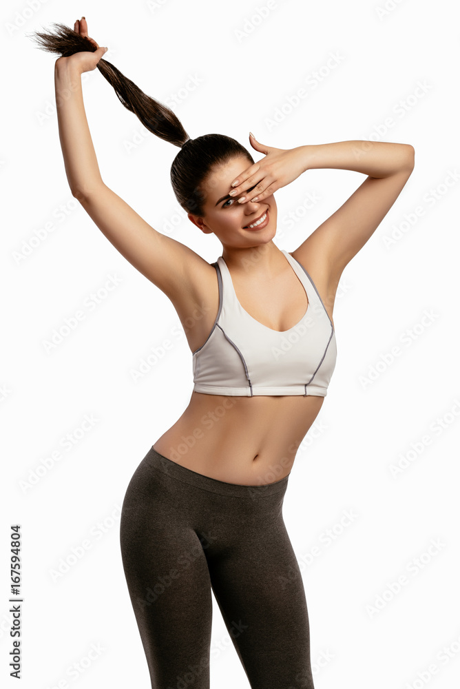 Beautiful smiling happy slim young sporty fitness woman Beautiful smiling happy slim young sporty fitness woman