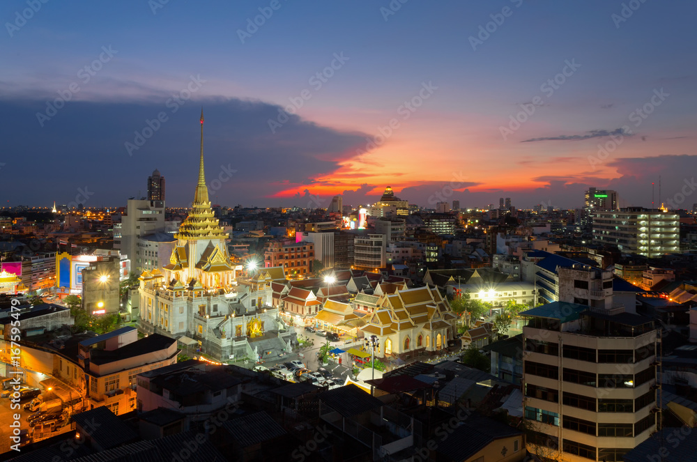 Top view of Bangkok cityscape,Wat Trimitr in chinatown or yaowarat area in Bangkok city, Bangkok, Thailand.