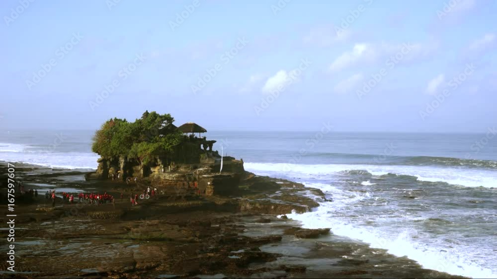 Time lapse of beautiful view in Tanah Lot Temple with wave and moving cloud at Bali, Indonesia Time lapse of beautiful view in Tanah Lot Temple with wave and moving cloud at Bali, Indonesia