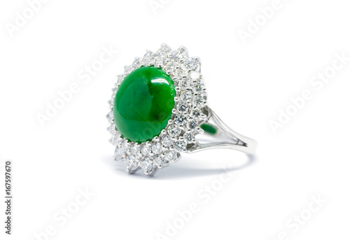 Closed up green jade with diamond and gold ring isolated
