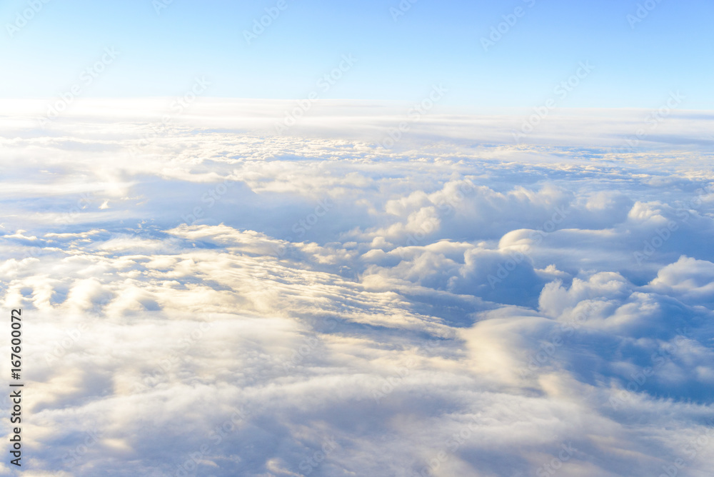 clouds sky skyscape. view from the window of an airplane flying in the clouds, top view clouds like  the sea of clouds sky background