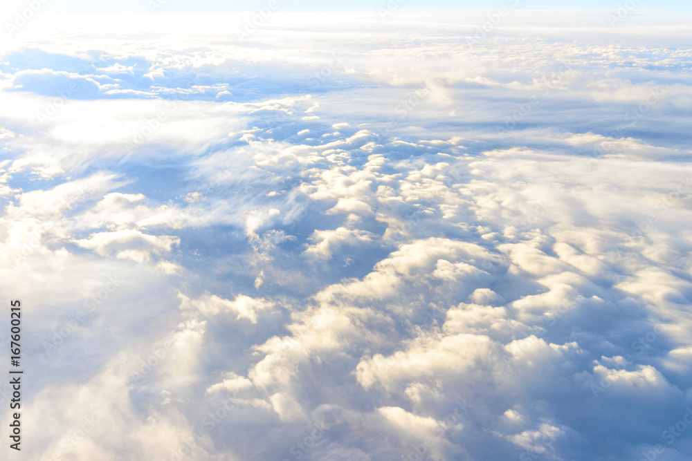 clouds sky skyscape. view from the window of an airplane flying in the clouds, top view clouds like  the sea of clouds sky background