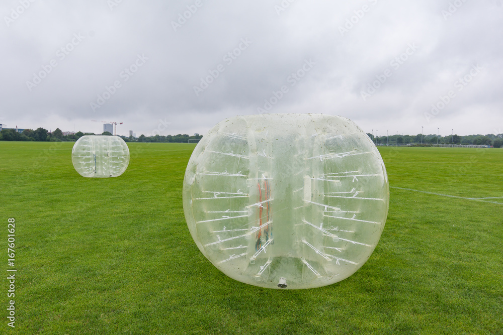 Playing soccer in a bumperball, a new funsport in Copenhagen, Denmark - July 27, 2017